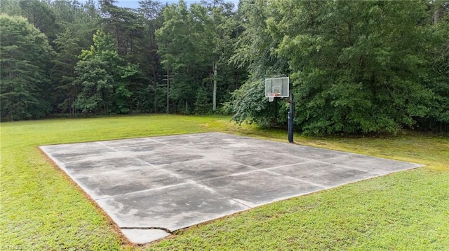 7239 Bulb Rd, Julian, NC 27283 - view of sport court with basketball hoop and a lawn