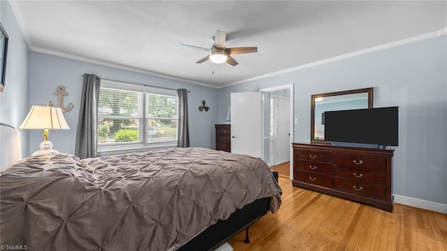1926 Downing Dr, Burlington, NC 27215 - bedroom featuring wood finished floors, ornamental molding, and ceiling fan