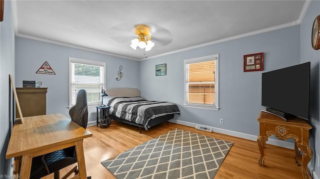 1926 Downing Dr, Burlington, NC 27215 - bedroom with crown molding, wood finished floors, ceiling fan, and an office area