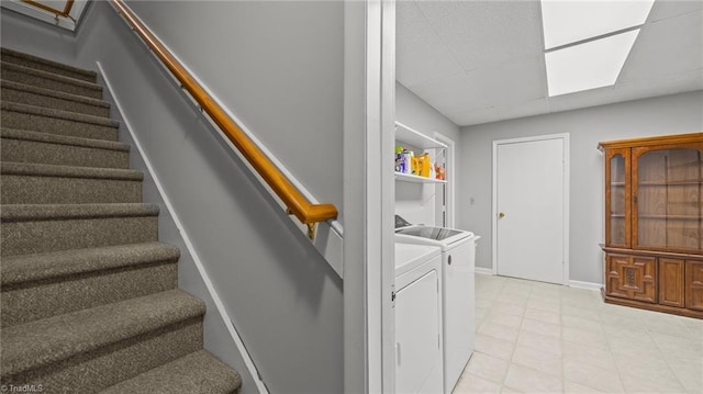 1926 Downing Dr, Burlington, NC 27215 - laundry room featuring separate washer and dryer and light tile patterned flooring