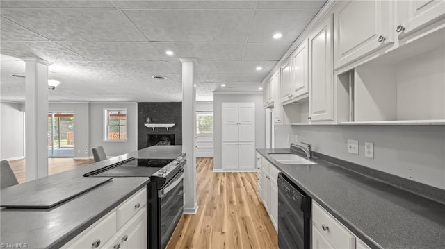 1926 Downing Dr, Burlington, NC 27215 - kitchen featuring electric stove, dishwasher, light wood finished floors, dark countertops, and recessed lighting