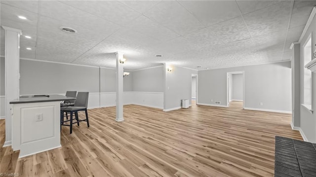 1926 Downing Dr, Burlington, NC 27215 - basement with light wood finished floors and ornamental molding