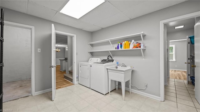 1926 Downing Dr, Burlington, NC 27215 - washroom featuring independent washer and dryer and light flooring