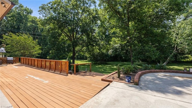 1926 Downing Dr, Burlington, NC 27215 - deck with a patio, a lawn, and view of wooded area