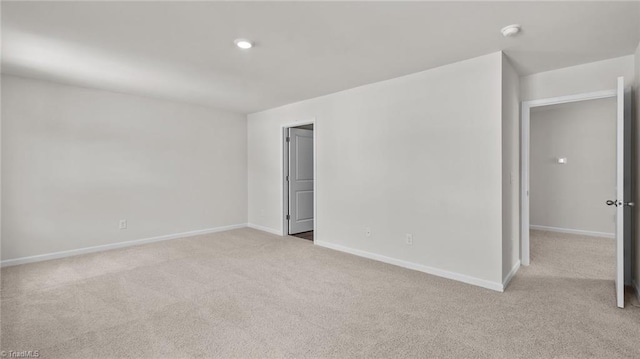 6598 Capstone Ct, Rural Hall, NC 27045 - spare room with light colored carpet, baseboards, and a smoke detector