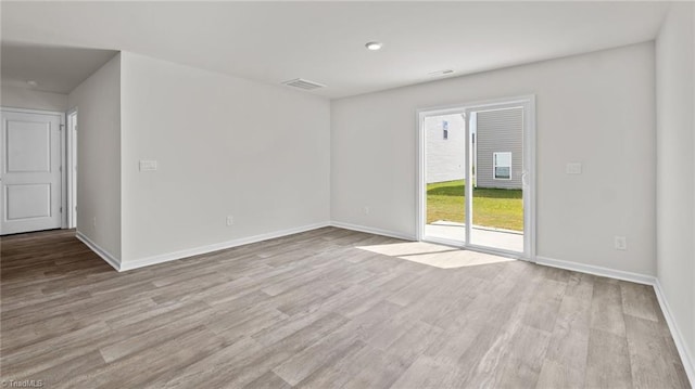 6598 Capstone Ct, Rural Hall, NC 27045 - empty room featuring light wood finished floors and baseboards