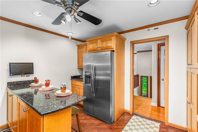 3228 Valley Rd, Winston-Salem, NC 27106 - kitchen featuring stainless steel fridge, ornamental molding, ceiling fan, dark wood-style flooring, and a breakfast bar