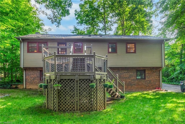 3228 Valley Rd, Winston-Salem, NC 27106 - rear view of house featuring a yard, stairs, brick siding, and a wooden deck