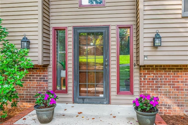 3228 Valley Rd, Winston-Salem, NC 27106 - property entrance featuring brick siding