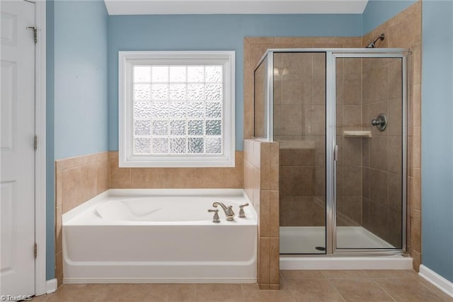 3704 Worthing Ct, Greensboro, NC 27455 - full bathroom with a bath, a shower stall, and tile patterned flooring