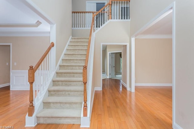 3704 Worthing Ct, Greensboro, NC 27455 - stairs featuring hardwood / wood-style flooring, baseboards, and ornamental molding