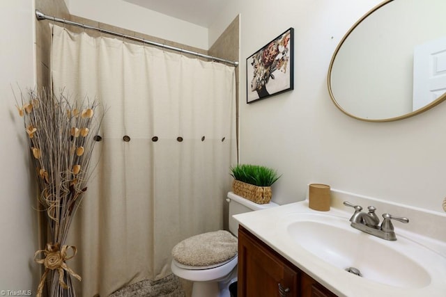 3704 Worthing Ct, Greensboro, NC 27455 - full bathroom featuring vanity, toilet, and a shower with shower curtain