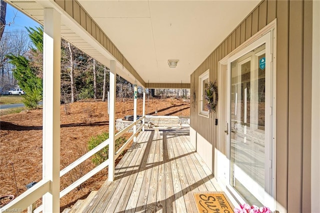 wooden deck featuring covered porch