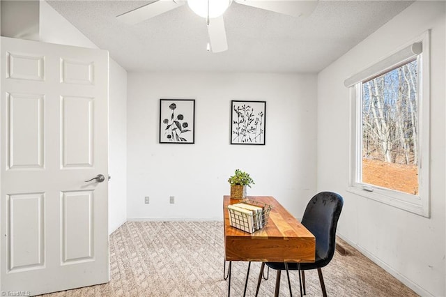 office featuring light colored carpet and ceiling fan