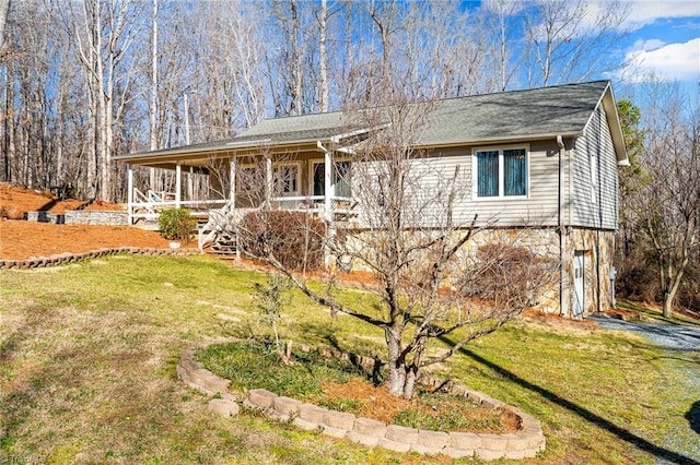 ranch-style home with a front yard