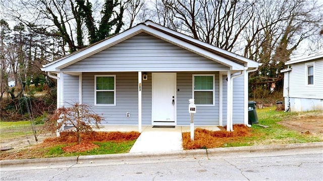 bungalow-style house featuring covered porch