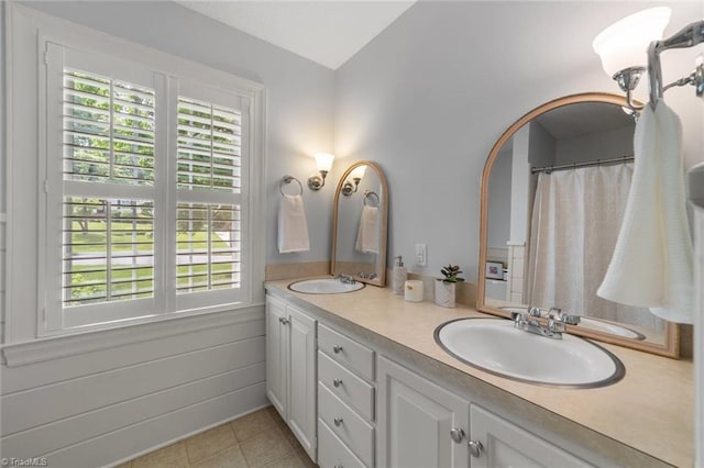 1020 Kenleigh Cir, Winston-Salem, NC 27106 - full bathroom featuring plenty of natural light, double vanity, and tile patterned floors