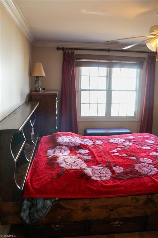 bedroom featuring crown molding