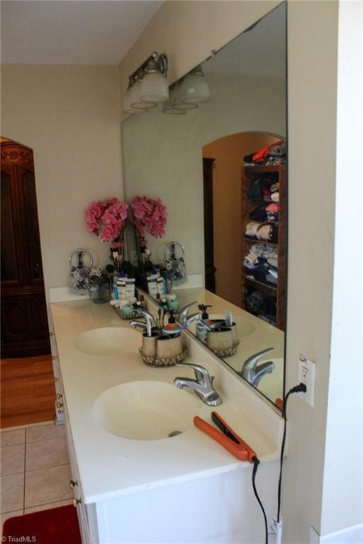 bathroom with vanity and tile patterned floors