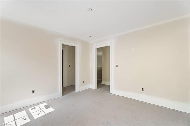 594 Cedar Dr, Winston-Salem, NC 27107 - spare room with baseboards and light carpet