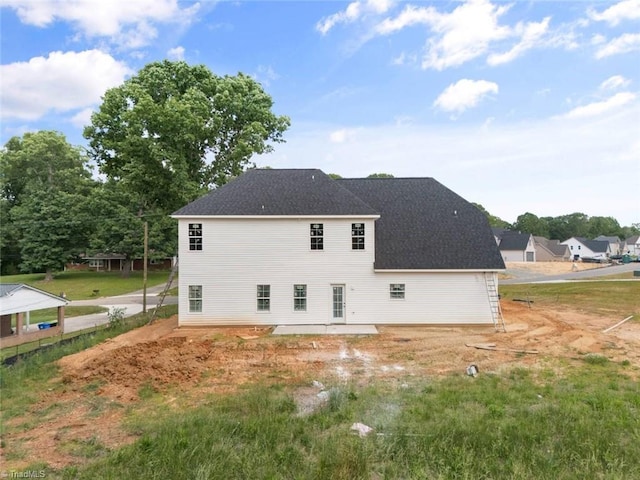 594 Cedar Dr, Winston-Salem, NC 27107 - rear view of house featuring a patio area and a shingled roof