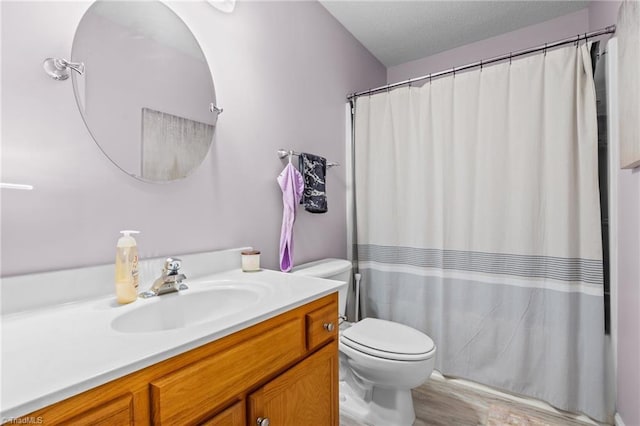 bathroom with hardwood / wood-style flooring, vanity, toilet, and a shower with shower curtain