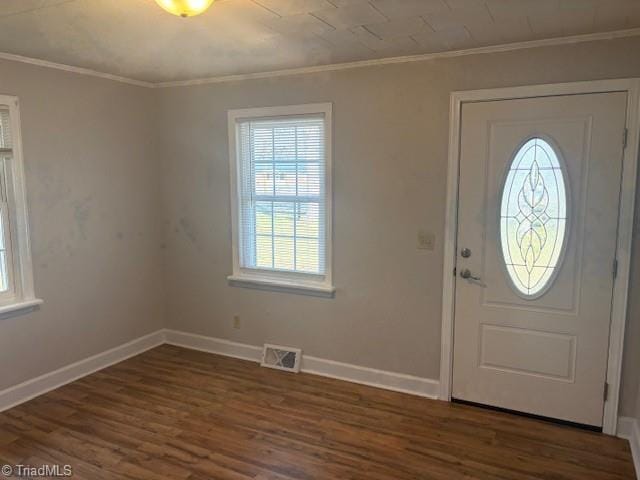 entryway featuring dark hardwood / wood-style floors and ornamental molding