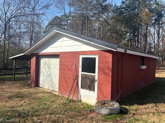 view of outbuilding with a garage