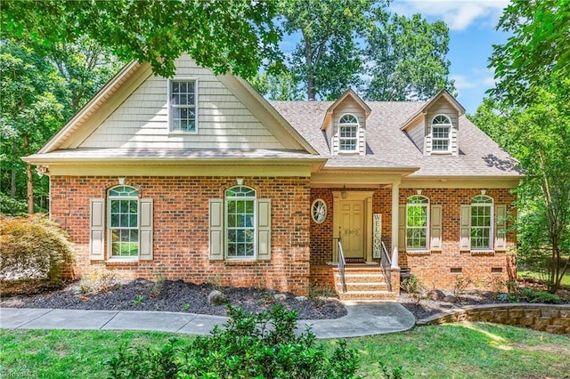 8300 Trottington Rd, Stokesdale, NC 27357 - view of front of house featuring brick siding and roof with shingles