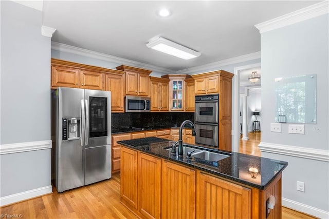 8300 Trottington Rd, Stokesdale, NC 27357 - kitchen featuring stainless steel appliances, brown cabinets, backsplash, glass insert cabinets, and light wood-style floors