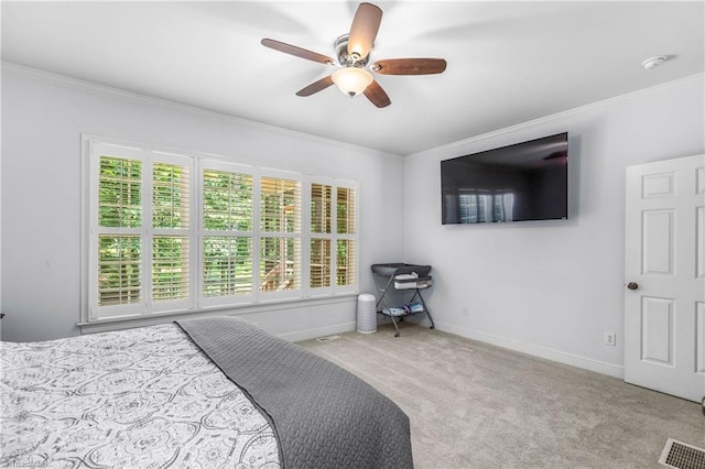 8300 Trottington Rd, Stokesdale, NC 27357 - carpeted bedroom featuring ornamental molding and ceiling fan