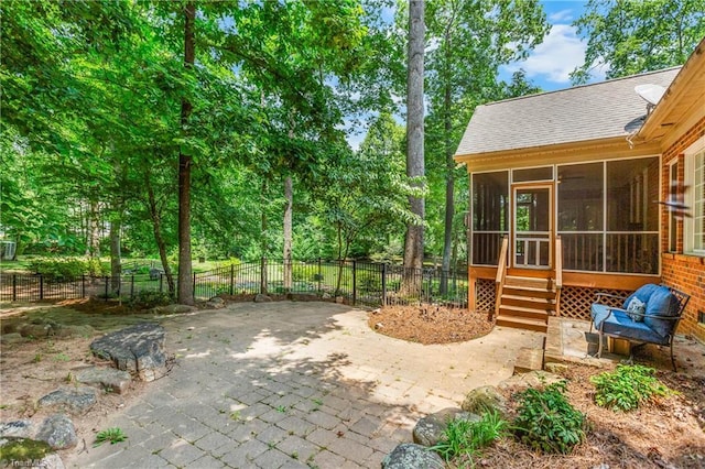 8300 Trottington Rd, Stokesdale, NC 27357 - fenced backyard with a sunroom and a patio area