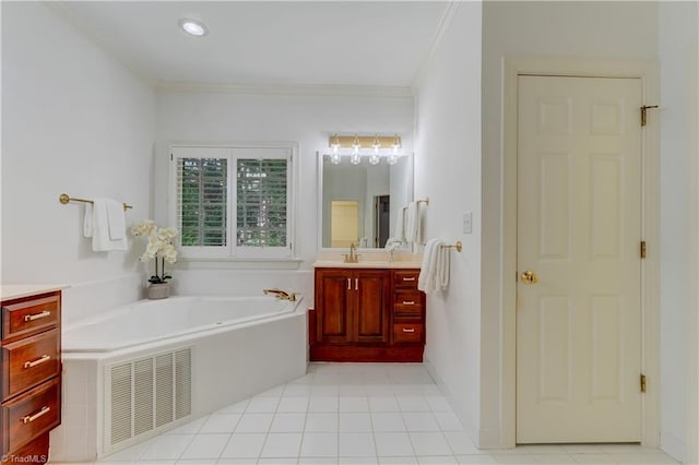 bathroom featuring tile patterned flooring, vanity, a bathing tub, and crown molding