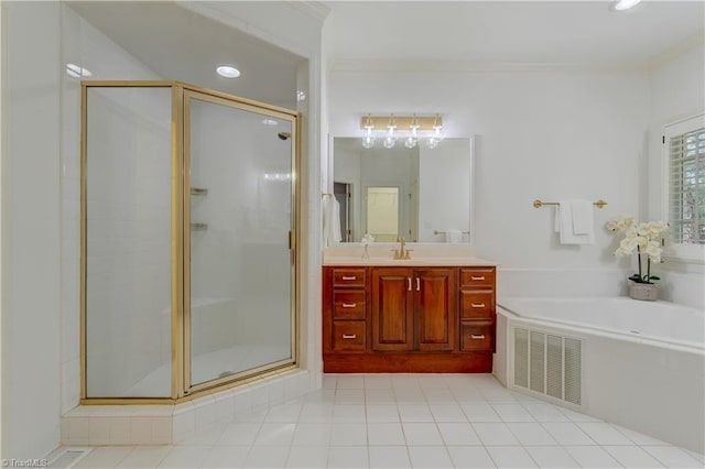 bathroom with plus walk in shower, vanity, crown molding, and tile patterned flooring