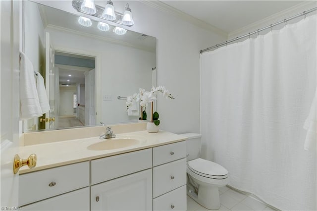 bathroom with toilet, vanity, tile patterned floors, and ornamental molding