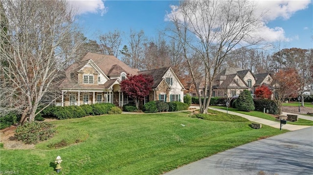 view of front of home featuring a front lawn