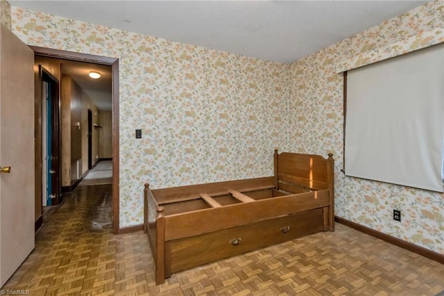 bedroom with parquet flooring