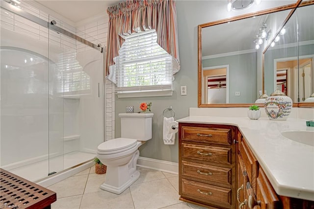 full bathroom featuring crown molding, tile patterned flooring, vanity, toilet, and a stall shower