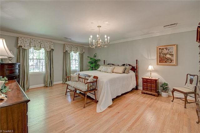 bedroom featuring visible vents, crown molding, baseboards, light wood-type flooring, and a notable chandelier