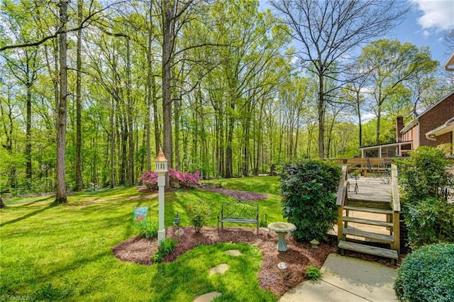 view of yard with a deck