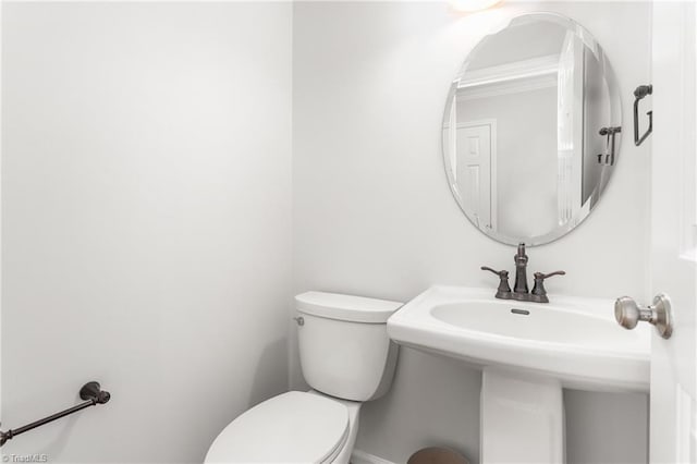 bathroom featuring toilet