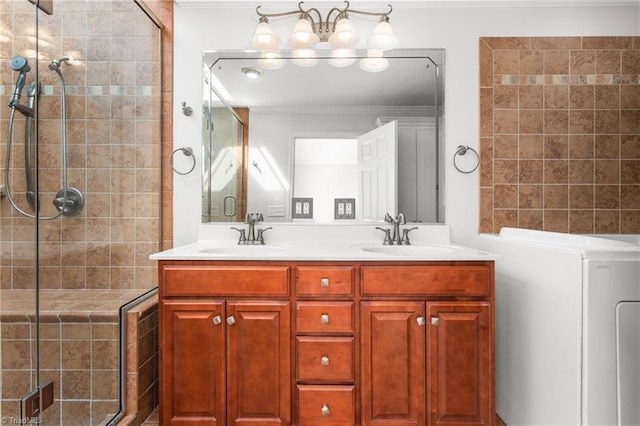 full bath with crown molding, double vanity, a sink, and a shower stall