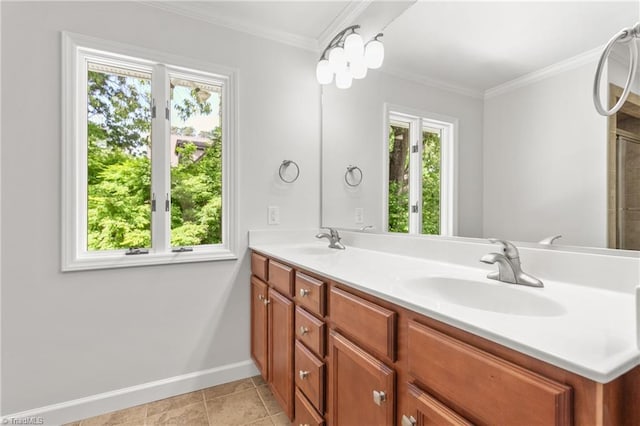 bathroom with a wealth of natural light, baseboards, and a sink