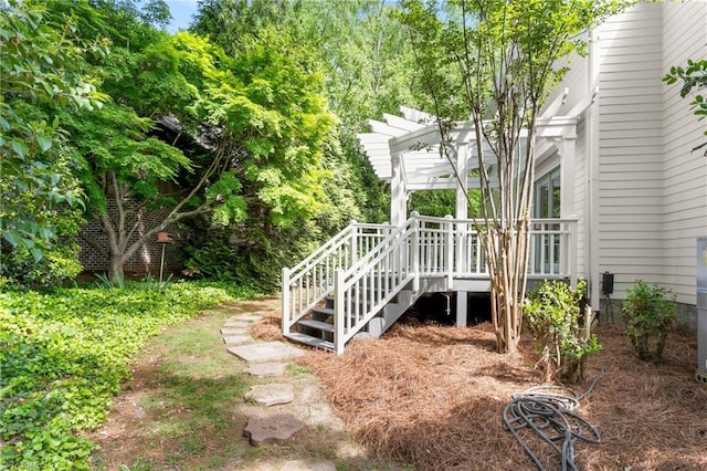 view of yard with a wooden deck