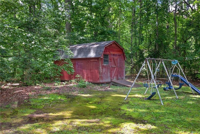 6006 Dehaven Rd, Pleasant Garden, NC 27313 - view of shed featuring a playground and a wooded view