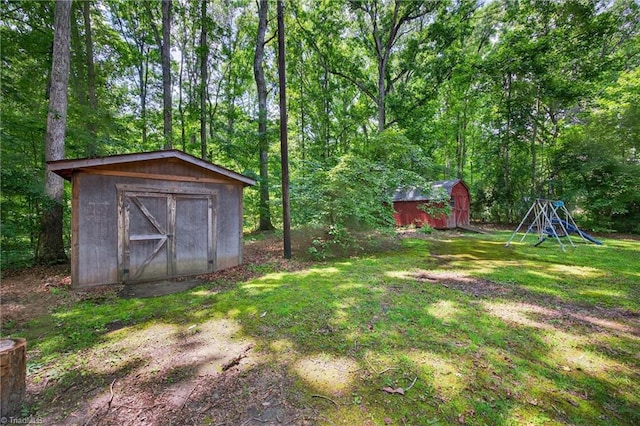 6006 Dehaven Rd, Pleasant Garden, NC 27313 - view of green lawn with a storage shed