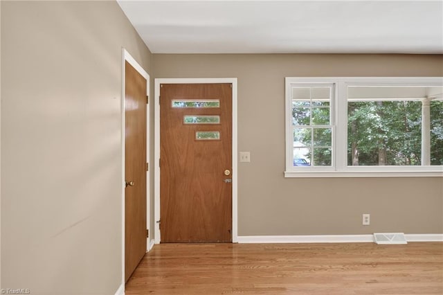 6006 Dehaven Rd, Pleasant Garden, NC 27313 - entrance foyer featuring wood finished floors