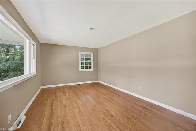 6006 Dehaven Rd, Pleasant Garden, NC 27313 - unfurnished room featuring light wood-type flooring and healthy amount of natural light