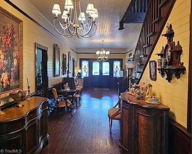 1715 Alfred Hartley Rd, Lenoir, NC 28645 - foyer featuring a chandelier, wood-type flooring, stairway, and ornamental molding