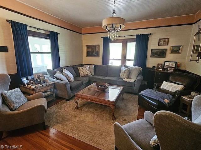 1715 Alfred Hartley Rd, Lenoir, NC 28645 - living room featuring wood finished floors and a chandelier
